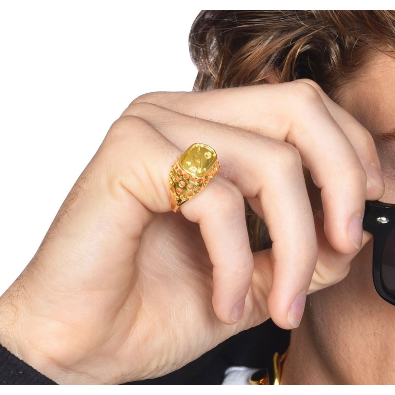 Golden signet ring with stones